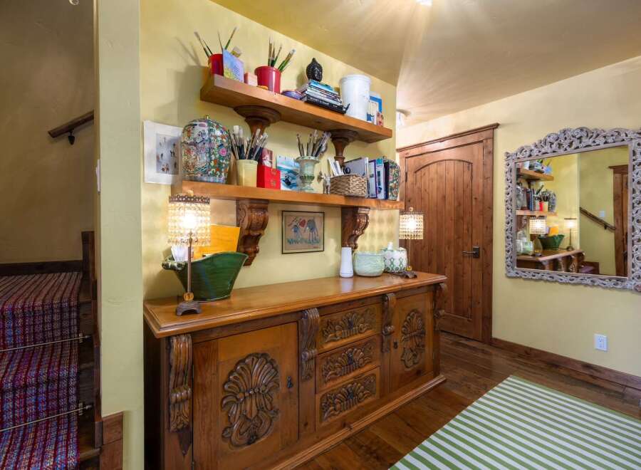 Step into a world of artistic charm with this beautifully decorated entryway.