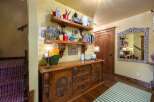 Step into a world of artistic charm with this beautifully decorated entryway.