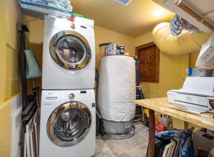 Discover the convenience of in-unit laundry with this property! This home features a modern stacked washer and dryer, making laundry day a breeze.
