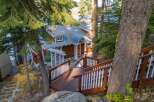Nestled amidst lush greenery, this charming property boasts a rustic facade and inviting ambiance.