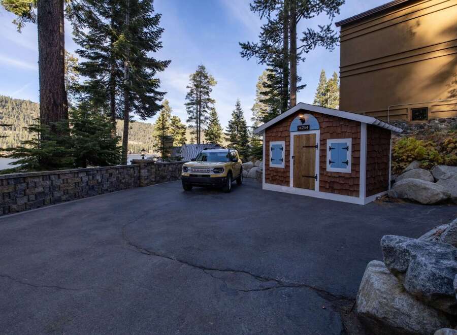 Discover the charm of this stunning property, featuring a beautifully designed shed with a rustic aesthetic.