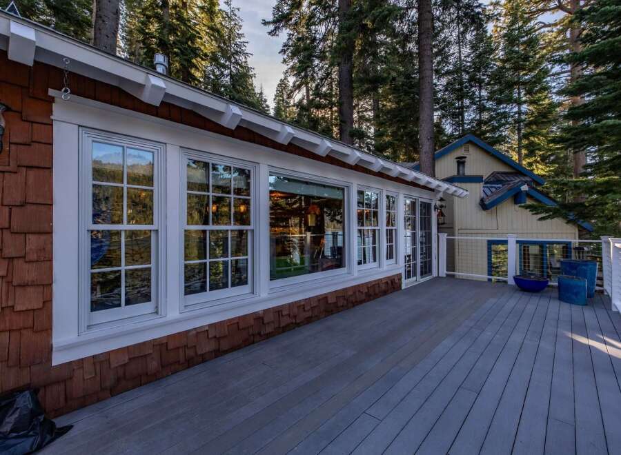 This stunning property boasts a beautiful deck, perfect for enjoying the serene surroundings.