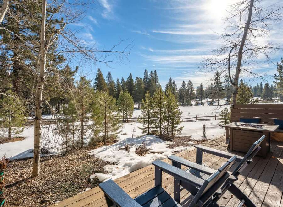 Enjoy breathtaking views from this stunning property! This home features a spacious deck perfect for relaxing and entertaining.