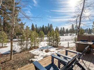Enjoy breathtaking views from this stunning property! This home features a spacious deck perfect for relaxing and entertaining.
