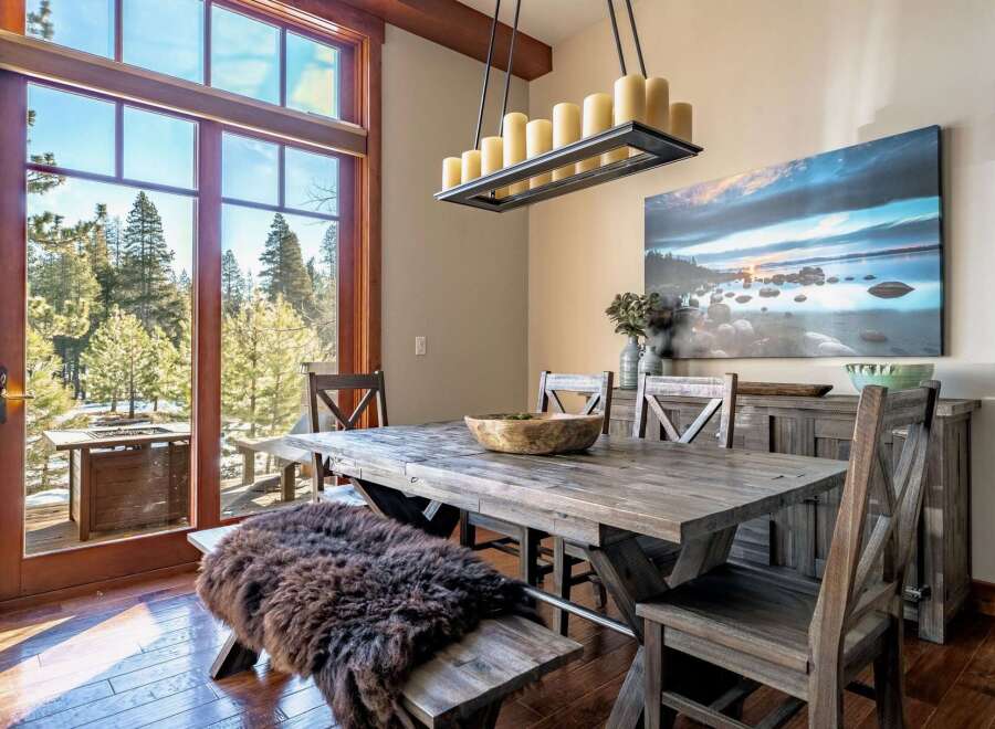 This stunning dining room boasts a rustic, yet elegant design, perfect for entertaining.