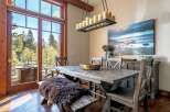 This stunning dining room boasts a rustic, yet elegant design, perfect for entertaining.