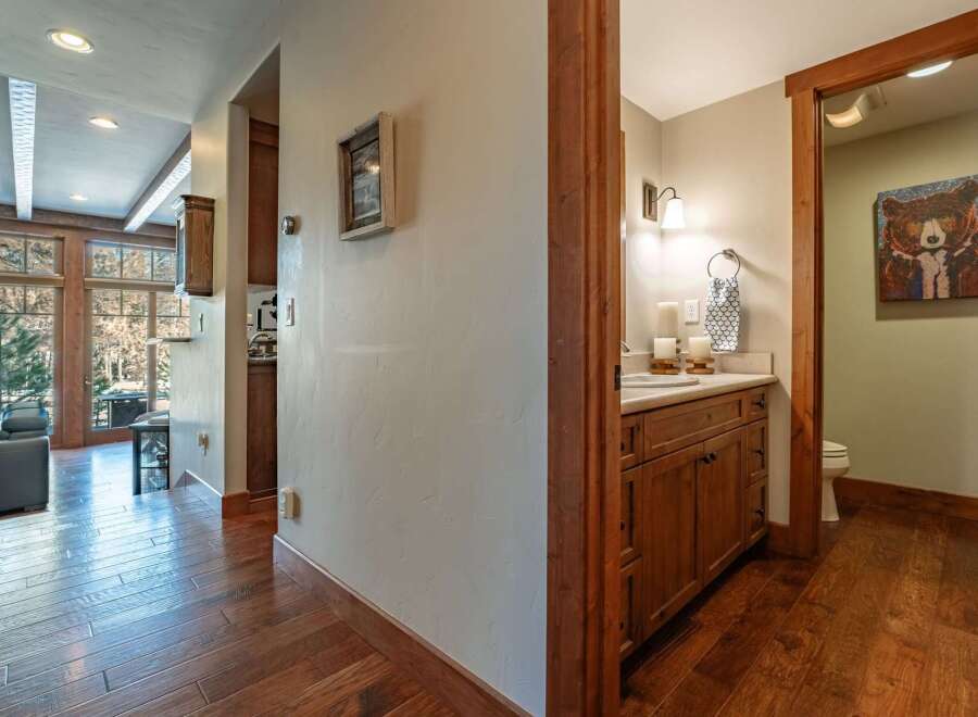 Step into luxury with this stunning property, showcasing exquisite hardwood floors and a beautifully designed interior.