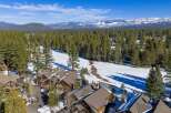 Nestled amidst a picturesque winter landscape, this stunning property offers a serene retreat.