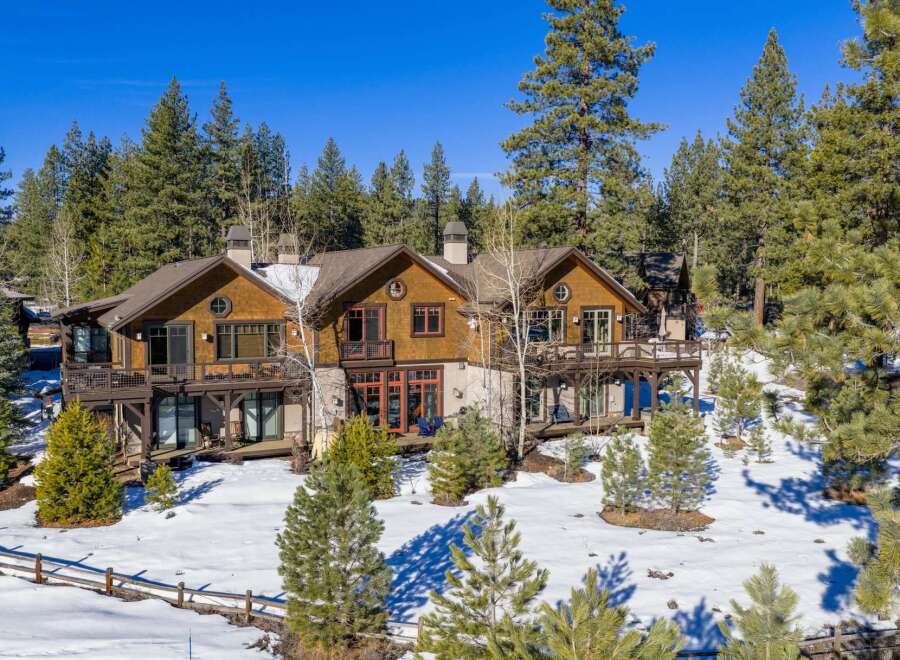 This stunning mountain home offers a luxurious retreat surrounded by nature.