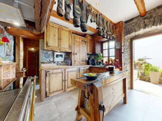 Step into a rustic kitchen that exudes charm and character.