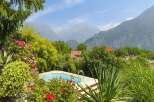 Escape to your own private oasis with this stunning property! Featuring a beautiful pool surrounded by lush greenery and breathtaking mountain views, this home offers the perfect blend of luxury and tranquility.