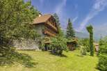Discover the charm of this stunning stone house nestled in a picturesque setting.
