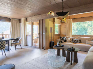 Experience the epitome of luxury living in this stunning property, boasting a warm and inviting interior with exquisite wooden accents throughout.