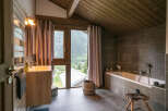 This stunning bathroom boasts a luxurious design with a modern touch.
