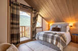 Experience the ultimate in cozy comfort with this stunning bedroom.