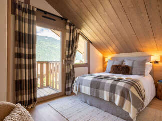 Experience the ultimate in cozy comfort with this stunning bedroom.