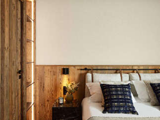 Experience rustic elegance in this cozy bedroom.