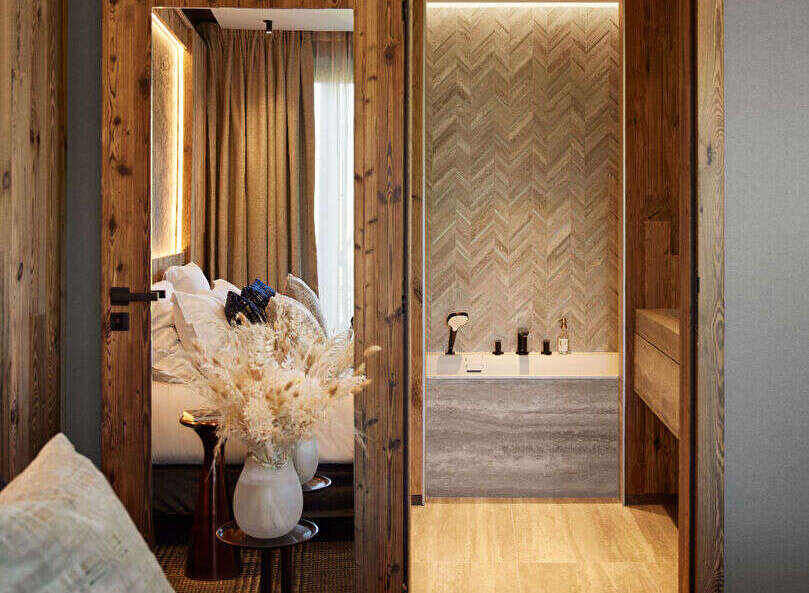 Step into luxury with this stunning property, showcasing exquisite wooden accents and a seamless blend of style and comfort.