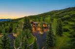 Nestled amidst lush greenery and rolling hills, this stunning mountain estate offers unparalleled luxury and privacy.