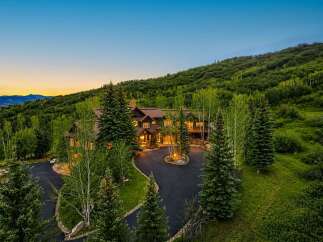 Nestled amidst lush greenery and rolling hills, this stunning mountain estate offers unparalleled luxury and privacy.