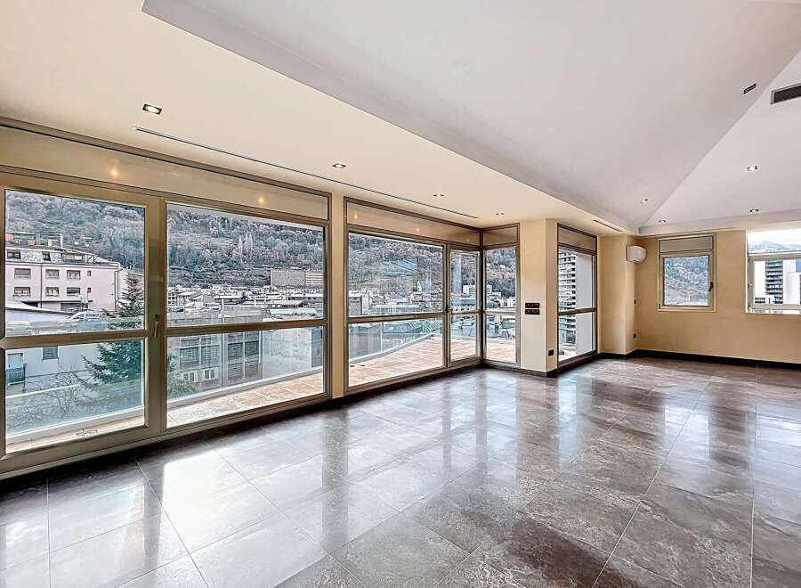 Experience luxury living with this stunning property featuring expansive windows that offer breathtaking views.