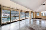 Experience luxury living with this stunning property featuring expansive windows that offer breathtaking views.