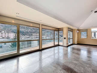 Experience luxury living with this stunning property featuring expansive windows that offer breathtaking views.