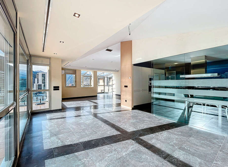 Experience luxury living in this stunning property, featuring expansive windows that flood the space with natural light and offer breathtaking views.