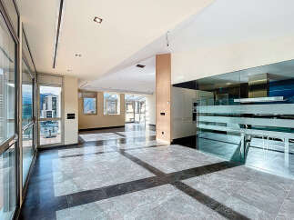 Experience luxury living in this stunning property, featuring expansive windows that flood the space with natural light and offer breathtaking views.