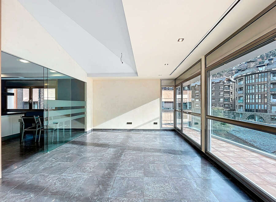 Experience luxury living in this stunning property with expansive windows offering breathtaking views.