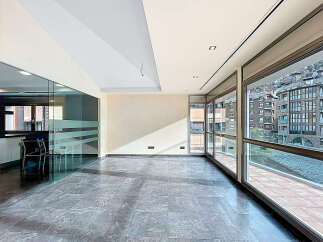 Experience luxury living in this stunning property with expansive windows offering breathtaking views.