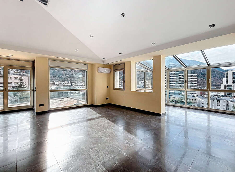 Discover luxury living in this stunning property, boasting expansive windows that flood the space with natural light and offer breathtaking city views.