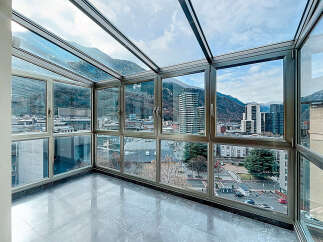 Experience breathtaking panoramic views from this stunning sunroom.