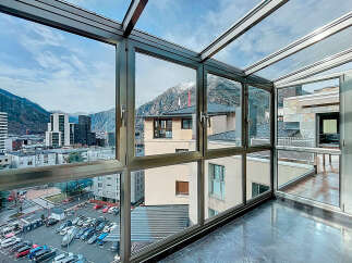 Experience breathtaking views from this stunning property! This modern space features expansive windows that flood the interior with natural light.