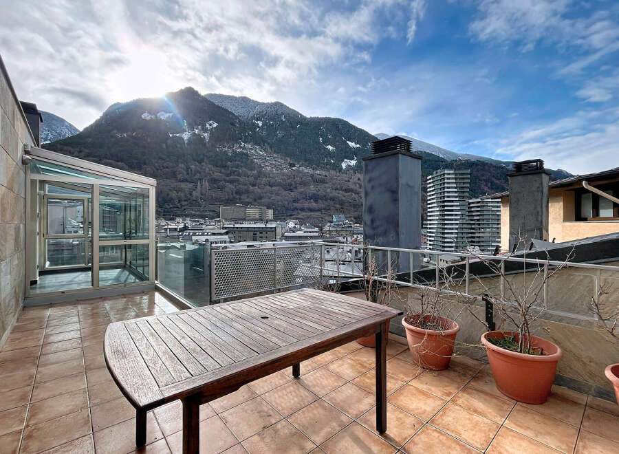 Enjoy breathtaking mountain views from this stunning rooftop terrace.