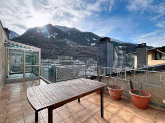 Enjoy breathtaking mountain views from this stunning rooftop terrace.