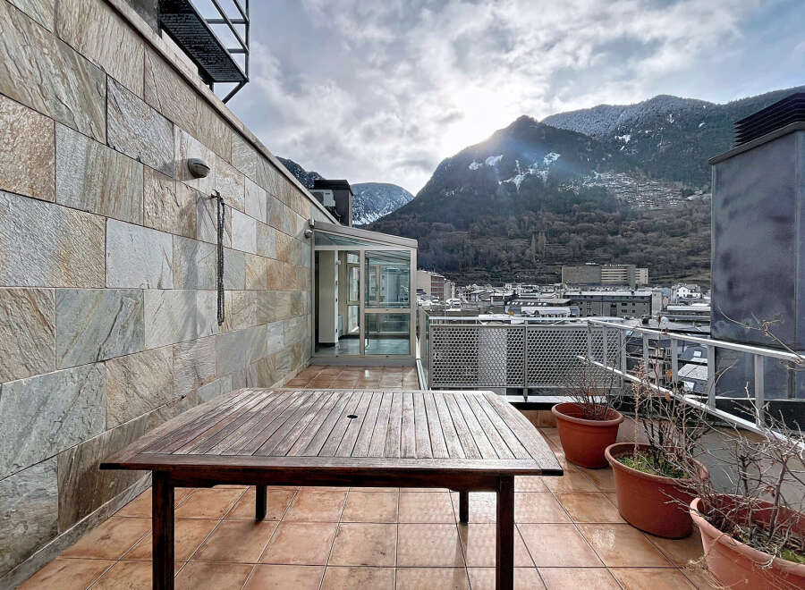 Enjoy breathtaking mountain views from this stunning rooftop terrace.