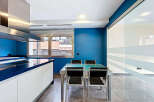 This modern kitchen boasts sleek design and functionality.