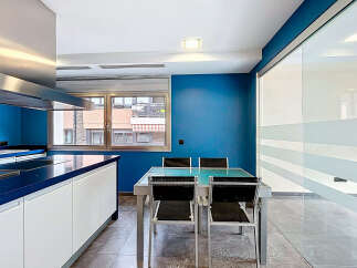 This modern kitchen boasts sleek design and functionality.