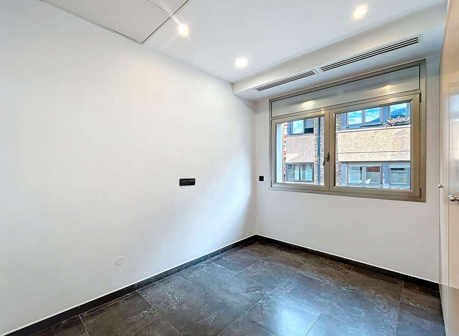 Discover this bright and modern room, perfect for a cozy living space.