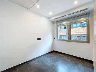 Discover this bright and modern room, perfect for a cozy living space.