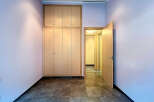 Discover this inviting space featuring a large built-in wardrobe, perfect for storage.