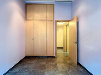 Discover this inviting space featuring a large built-in wardrobe, perfect for storage.