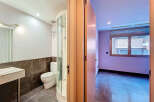 Step into this beautifully designed property featuring a modern bathroom with a sleek shower and a stylish vanity.