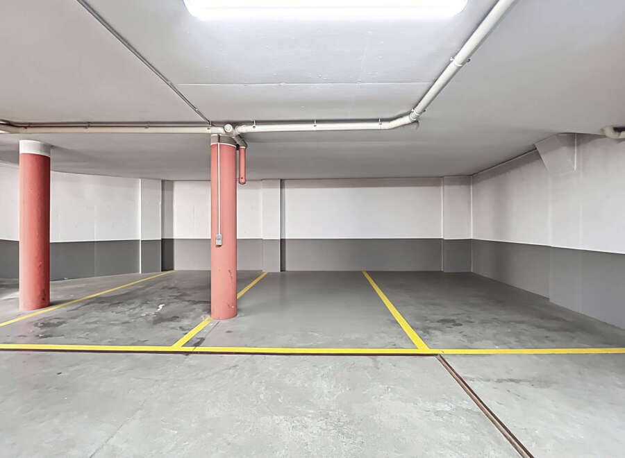 Explore this well-lit parking space, perfect for secure vehicle storage.
