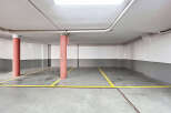 Explore this well-lit parking space, perfect for secure vehicle storage.