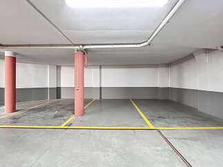 Explore this well-lit parking space, perfect for secure vehicle storage.