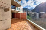Enjoy breathtaking mountain views from this stunning balcony.