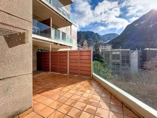 Enjoy breathtaking mountain views from this stunning balcony.