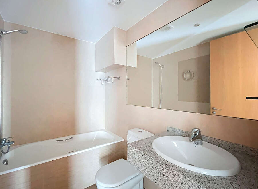 Step into a modern bathroom with a sleek design.